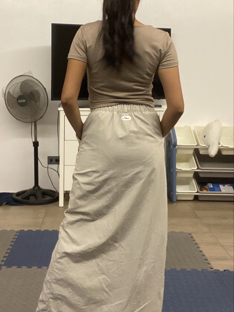 Take all 3 skirts (Category: Skirts) located in Santa Rosa. Submitted by hoardqueensdeclutter (Listing ID 1462523391, Image 2). Description: Comfy cargo maxi skirt with front slit. Features side and front cargo pockets, plus an elastic back waistband. Perfect for casual, stylish outfits. Fits xs to small.
