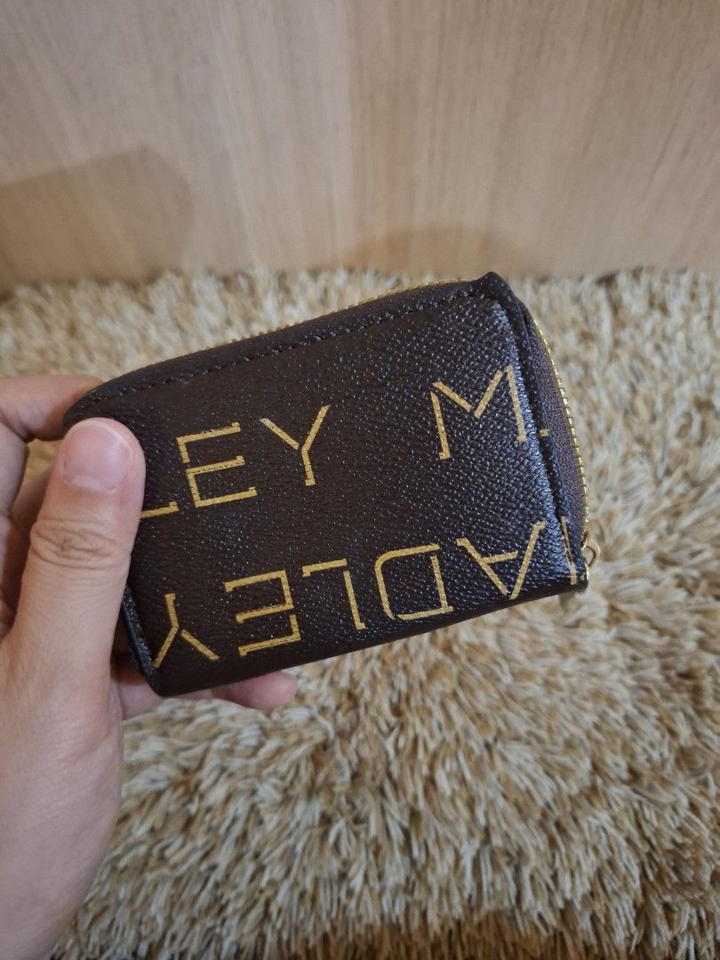 Take all card holder (Category: Wallets & Card holders) located in Rizal. Submitted by mirisica (Listing ID 1462566224, Image 3). Description: - Brand new Radley London card holder - Available in signature brown monogram print or plain black - Multiple internal card slots - Secure zipper closure - Comes in original packaging.