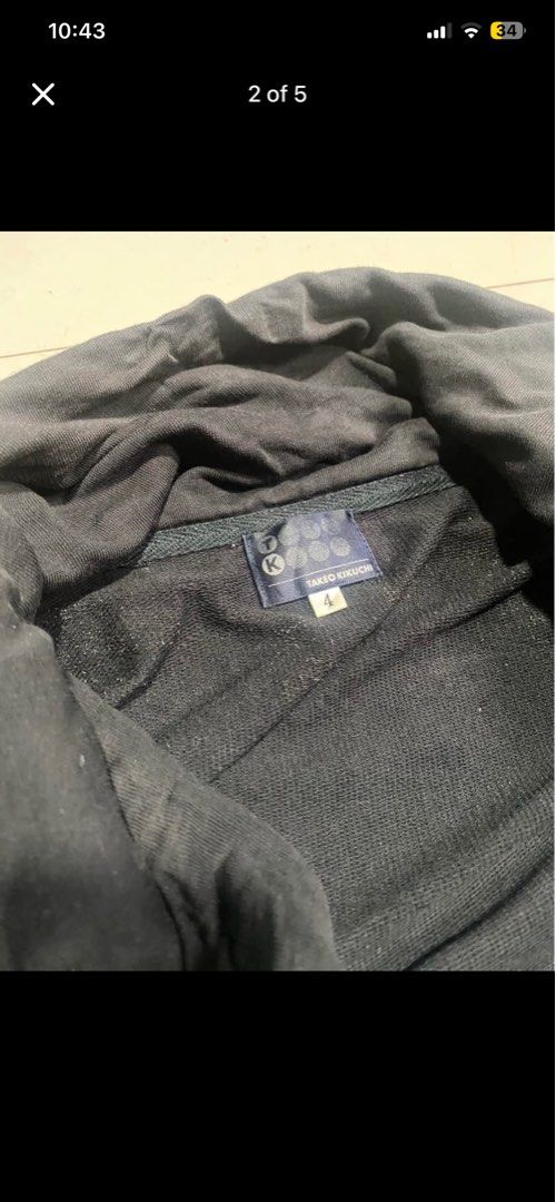 TAKEO KIKUCHI Black Track Jacket Size 4 (Category: Coats, Jackets and Outerwear) located in Baguio. Submitted by yunothewizardking (Listing ID 1462460640, Image 2). Description: - Brand: TAKEO KIKUCHI - Color: Black - Style: Track Jacket - Size: Tag shows 4 - Features: Full zip front, mock neck collar, white piping details on sides - Origin: Made in China - Ideal for: Casual wear, light workouts.