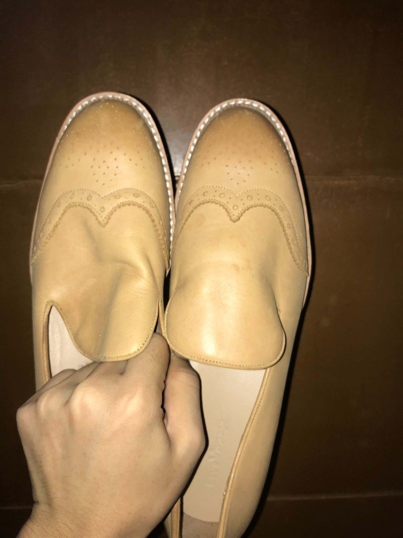 Tan Leather Loafers with Brogue Detailing (Category: Casual Shoes) located in Mandaluyong City. Submitted by ace07290 (Listing ID 1462653104, Image 2). Description: - Classic tan leather loafers - Features elegant brogue detailing on the toe - Easy slip-on style - Low stacked heel for comfort - Shows minimal signs of wear, indicating light use - Ideal for elevating your smart casual outfits FS Leather Loafer Shoes. Bought in Ukay Ukay and used on