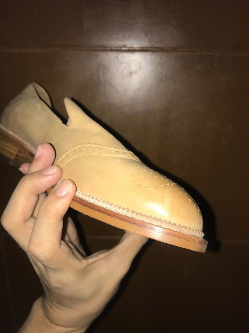 Tan Leather Loafers with Brogue Detailing (Category: Casual Shoes) located in Mandaluyong City. Submitted by ace07290 (Listing ID 1462653104, Image 1). Description: - Classic tan leather loafers - Features elegant brogue detailing on the toe - Easy slip-on style - Low stacked heel for comfort - Shows minimal signs of wear, indicating light use - Ideal for elevating your smart casual outfits FS Leather Loafer Shoes. Bought in Ukay Ukay and used on