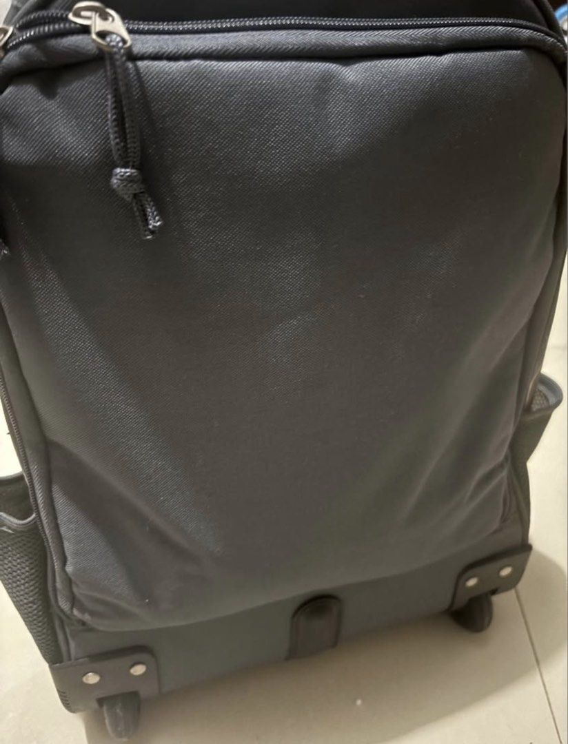 Technopack Rolling Backpack with Wheels and Cute Bear Charm (Category: Backpacks) located in Batangas. Submitted by jmo1025 (Listing ID 1462447592, Image 2). Description: - Cool Technopack rolling backpack - Dark grey with a pink swirl pattern - Wheels and retractable handle for easy transport - Padded shoulder straps for comfortable carrying - Comes with a cute bear charm - Plenty of space inside for books and essentials.