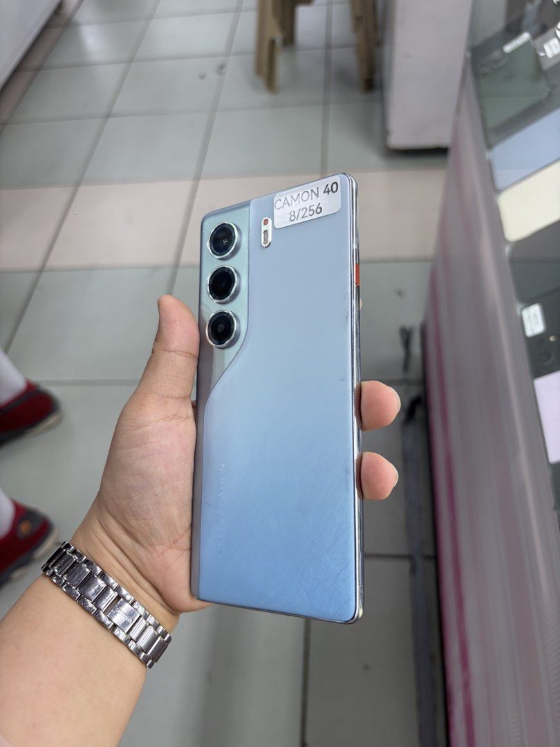 Tecno Camon 40 256/8gb FU NTC No issue All working (Category: Android Others) located in San Juan City. Submitted by javedsgadgetshop (Listing ID 1462446118, Image 3). Description: PTPA : Padelete po if bawal ❌ Here's the QUICK INFO ➡️ Tecno Camon 40 ➡️ 256gb ➡️ Blue COLOR ➡️ NTC PHYSICAL SIM ➡️ 95% MAKINIS & Good BATT ➡️ STORE WARRANTY ➡️ WITH Case & CHARGER - serial can be check on apple website |Money back if its proven fake ( for iphone only 