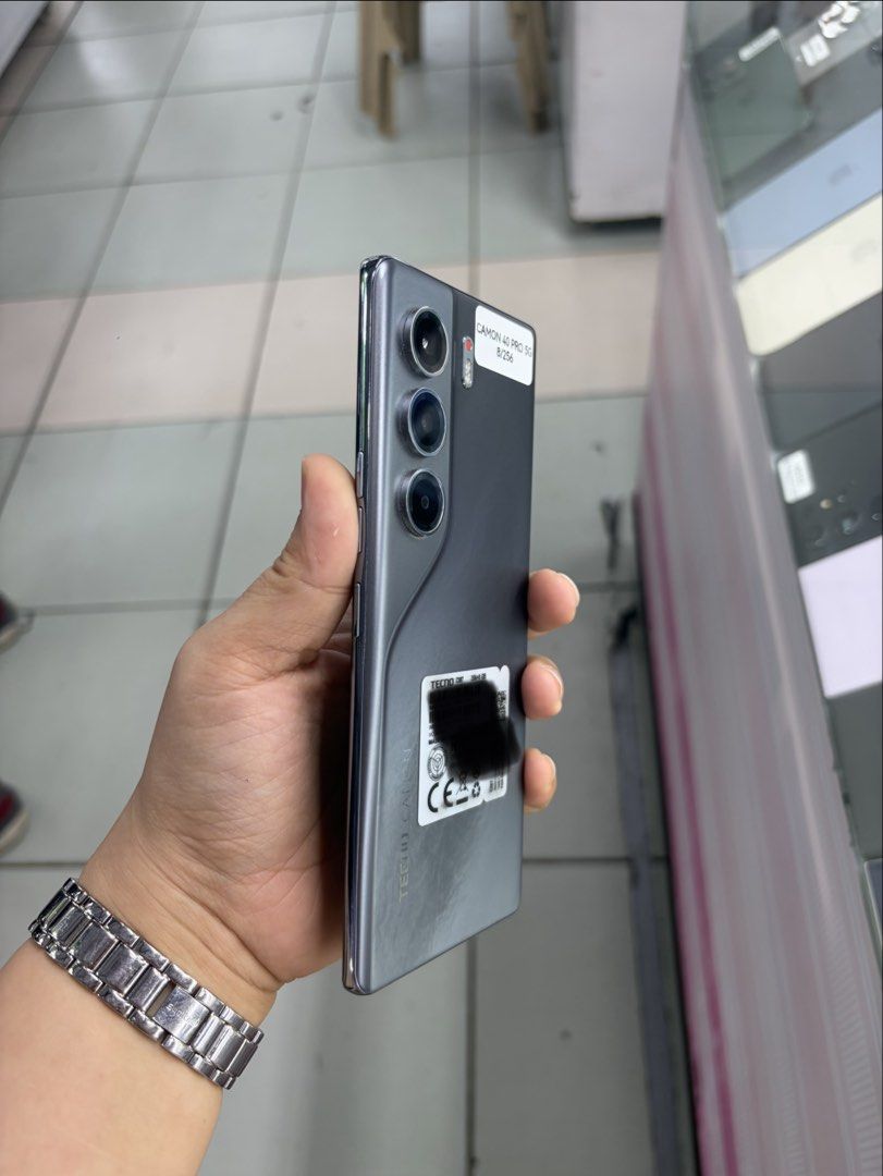 Tecno Camon 40 Pro 5G 256gb FU NTC No issue (Category: Android Others) located in San Juan City. Submitted by javedsgadgetshop (Listing ID 1462446836, Image 2). Description: PTPA : Padelete po if bawal ❌ Here's the QUICK INFO ➡️ Tecno Camon 40 Pro 5G ➡️ 256gb ➡️ Black COLOR ➡️ NTC PHYSICAL SIM ➡️ 95% MAKINIS & Good BATT ➡️ STORE WARRANTY ➡️ WITH Case & CHARGER - serial can be check on apple website |Money back if its proven fake ( for iphone only