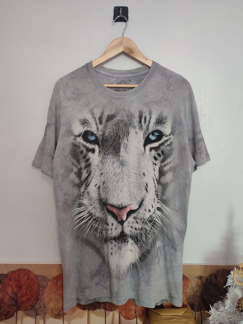 The Mountain White Tiger Tee Dated @2011 (Category: Tshirts & Polo Shirts ) located in Ibajay. Submitted by trendholicrepublique (Listing ID 1462471583, Image 1). Description: The Mountain White Tiger Tee Dated @2011 399 Php Color Rate 9.5/10 Medium On Tag (Fit to Large) Dimes 21.5 x 30 Very Good to Excellent Condition (need wash).