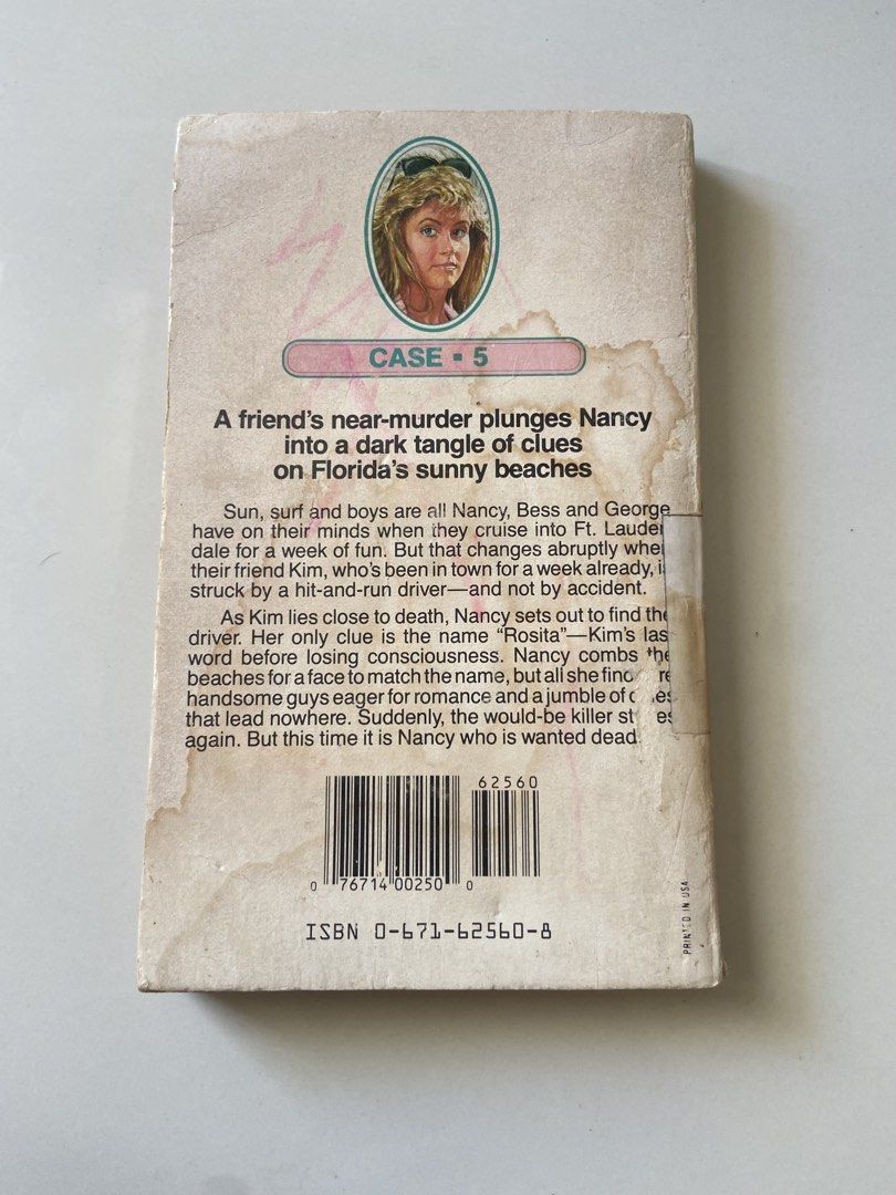 ⭐️The Nancy Drew Files Case 5: Hit and Run Holiday (Category: Storybooks) located in Bangui. Submitted by loricam (Listing ID 1462487772, Image 2). Description: - Nancy Drew Files Book 5: Hit and Run Holiday - Dive into a sunny Florida beach mystery! - Nancy investigates a hit-and-run case. - Condition: Used, with visible wear on cover and pages. - A must-have for any Nancy Drew enthusiast!.