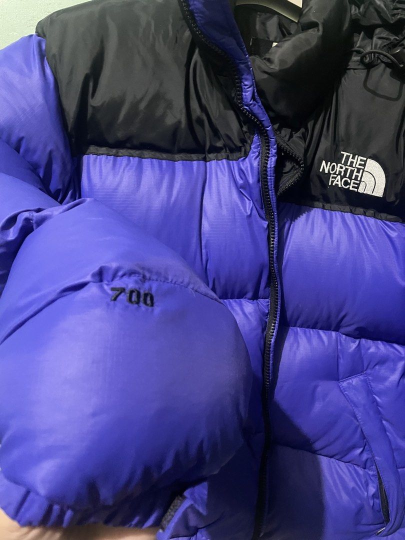 The North Face 700 Puffer Jacket - Purple & Black (Category: Coats, Jackets and Outerwear) located in Baguio. Submitted by claw_set (Listing ID 1462590043, Image 2). Description: - The North Face 700 puffer jacket - Striking bright purple and black colorway - Iconic TNF logo on chest and sleeve - Convenient inner zippered pocket - Adjustable hem with drawstrings for a custom fit - Ideal for staying warm in cold weather 23x28.