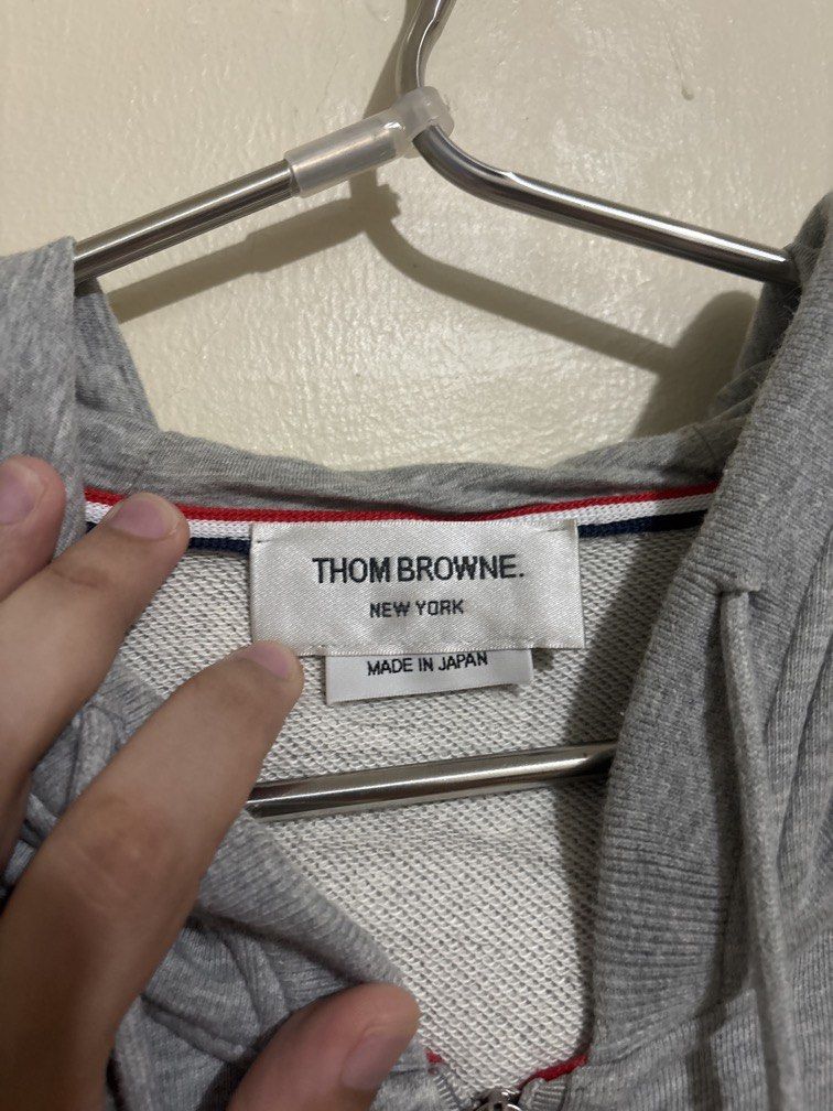 Thom Browne (Category: Hoodies) located in Muntinlupa City. Submitted by owrayttttt (Listing ID 1462553642, Image 3). Description: - Thom Browne Zip up Hoodie - Size 3 on tag - Actual Dimes is 22x28 - Complete tags - Free shipping via j&t.