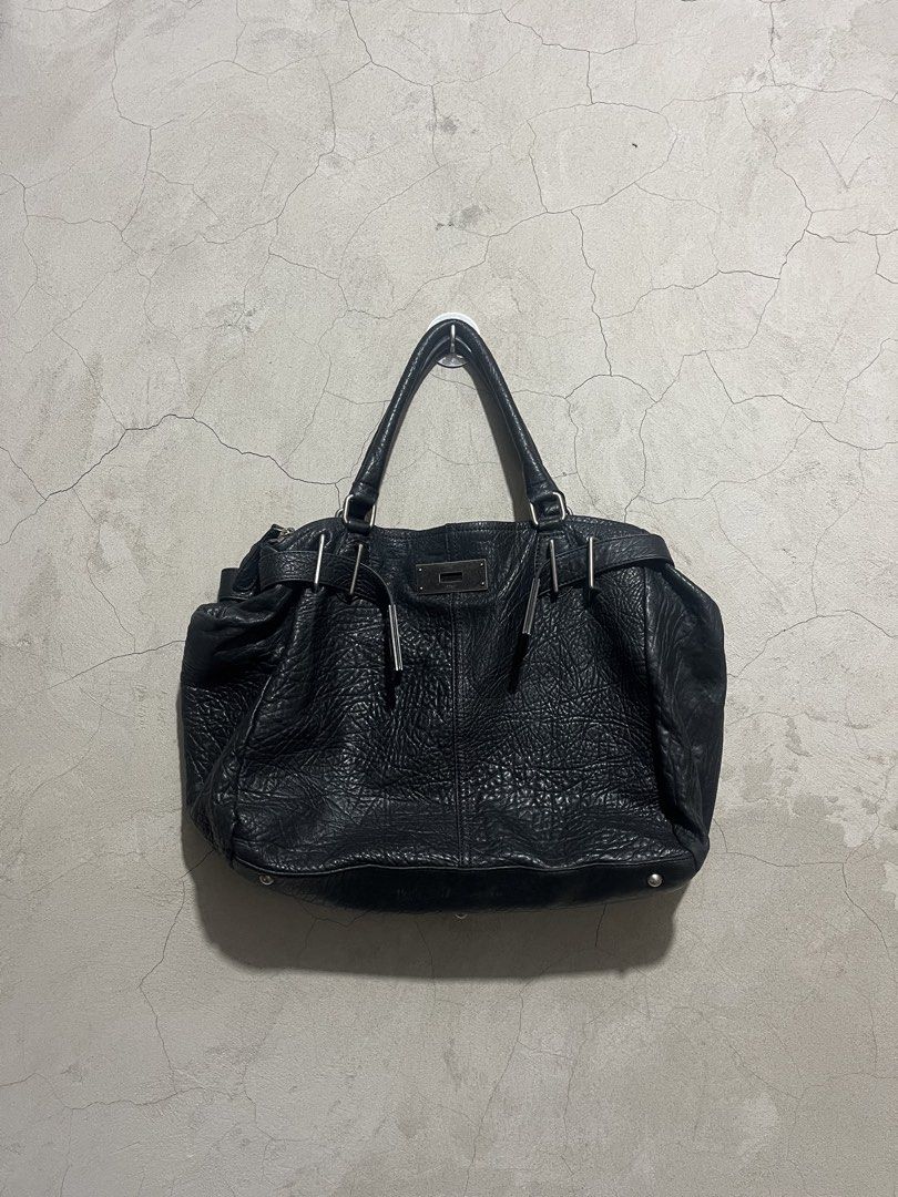 TIME Postmodern Firkin Satchel (Category: Luxury Bags & Wallets) located in Cagayan de Oro. Submitted by vintagevvvictim (Listing ID 1462660497, Image 1). Description: Issue: missing turnlock.