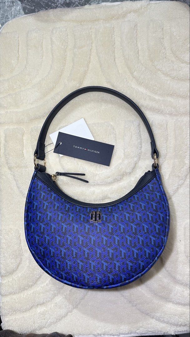 Tommy Hilfiger Blue Crescent Hobo Bag (Category: Shoulder Bags) located in Santa Maria. Submitted by asdfghzl (Listing ID 1462543915, Image 1). Description: Can do layaway payment Brand New Never been used Blue - avail ✅ Green - SOLD ❌ Super ganda sa personal !! 100% authentic bought from 🇨🇦 Payment: GCASH or BDO .