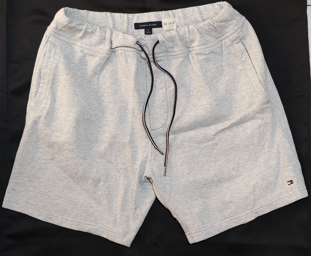 Tommy Hilfiger Grey Sweat Shorts Size M (Category: Shorts) located in Tagbilaran City. Submitted by freikfinds (Listing ID 1462493795, Image 1). Description: - Brand: Tommy Hilfiger - Color: Grey - Style: Sweat shorts - Features: Elastic waistband with drawstring, side pockets - Detail: Small Tommy Hilfiger logo on hem - Comfort: Comfortable and casual - Usage: Great for lounging or everyday wear -Butuan City, Mindanao .