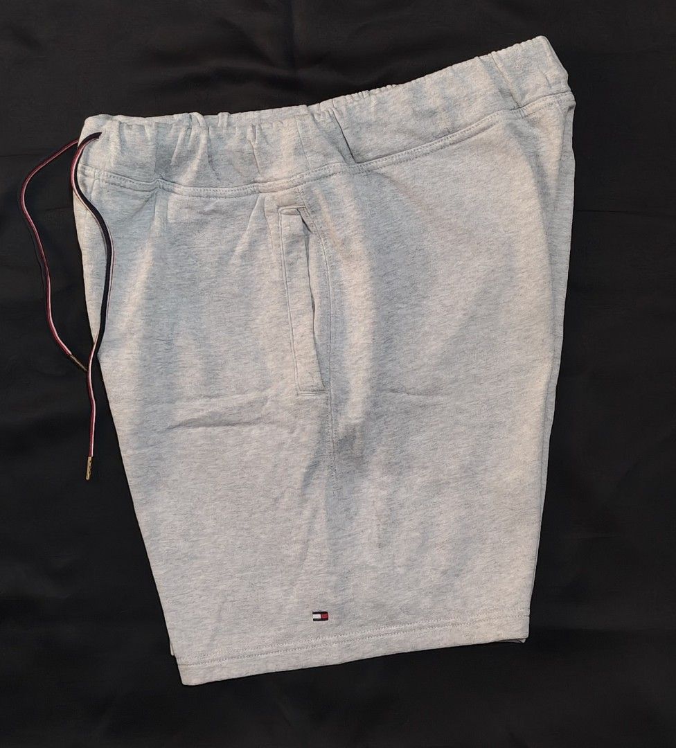 Tommy Hilfiger Grey Sweat Shorts Size M (Category: Shorts) located in Tagbilaran City. Submitted by freikfinds (Listing ID 1462493795, Image 2). Description: - Brand: Tommy Hilfiger - Color: Grey - Style: Sweat shorts - Features: Elastic waistband with drawstring, side pockets - Detail: Small Tommy Hilfiger logo on hem - Comfort: Comfortable and casual - Usage: Great for lounging or everyday wear -Butuan City, Mindanao .