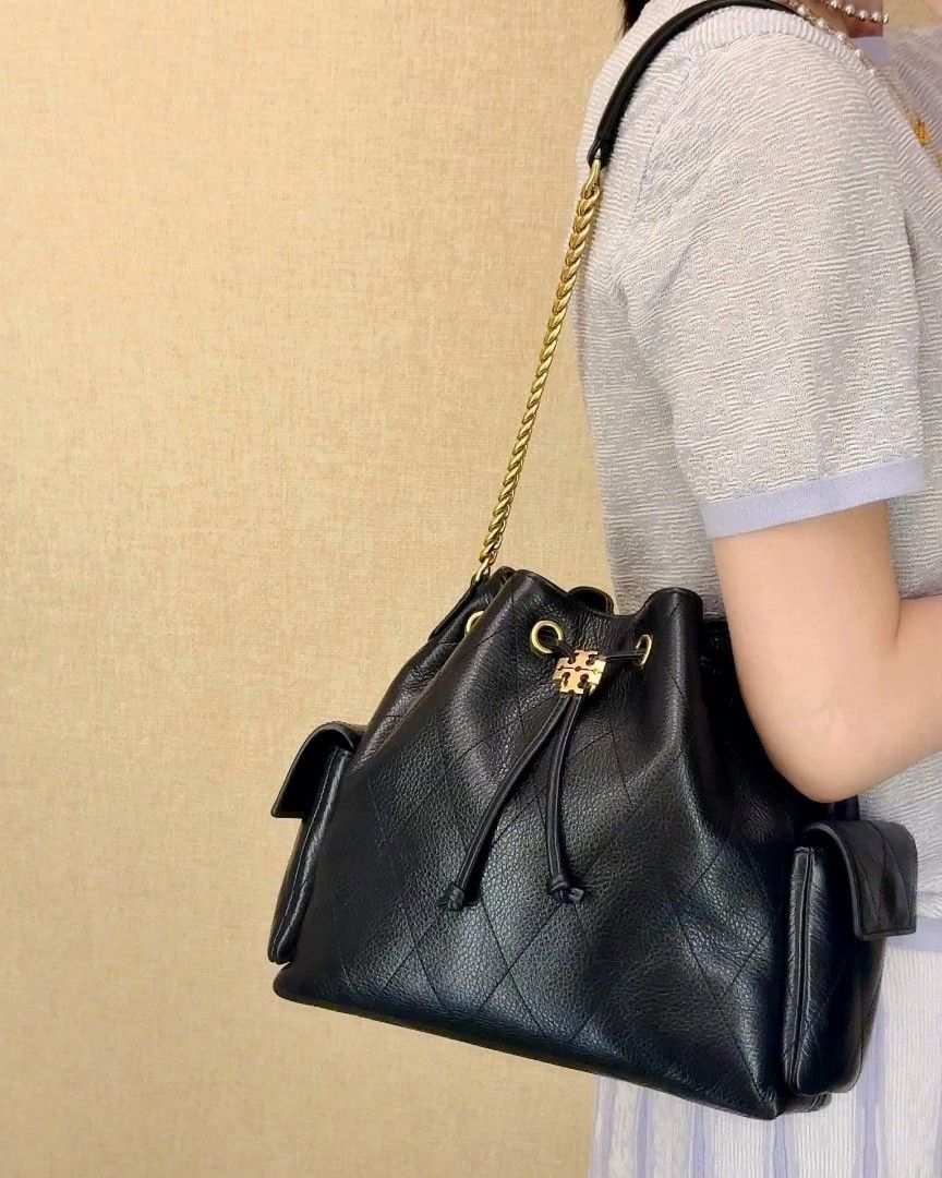 Tory Burch Charlie (Category: Luxury Bags & Wallets) located in Paoay. Submitted by rvf1230 (Listing ID 1462473140, Image 3). Description: - Authentic Tory Burch black leather bucket bag - Elegant quilted pattern - Secure drawstring closure - Versatile carrying options: top handle or long strap for shoulder/crossbody wear - Comes with original dust bag - Ideal for everyday style and practicality.