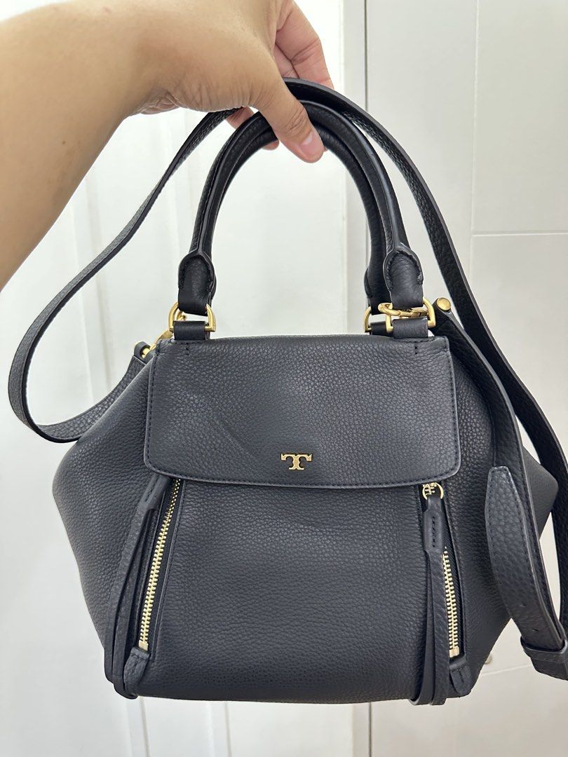 Tory Burch Half Moon All Leather Tote (Category: Luxury Bags & Wallets) located in Pasig City. Submitted by tinafies (Listing ID 1462648762, Image 1). Description: All leather 2-way handbag and crossbody bag, beautifull structured and spacious, similar to how the Hermes Lindy bag is structured for the top opening (double zippered flap magnetic closure).