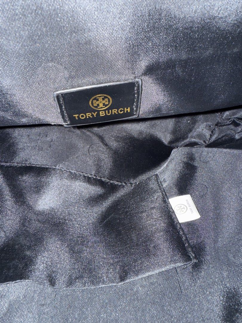 Tory Burch Tote Bag (Category: Luxury Bags & Wallets) located in Makati City. Submitted by amos411 (Listing ID 1462461485, Image 3). Description: Tory Burch Monogram Tote Bag Not OG Size: Large Color: Black Can fit 11-13inch ipad or laptop RFS: decluttering.