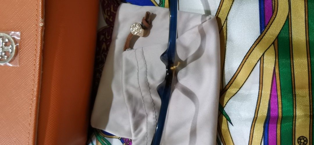Tory Burch TY7131 Eyeglasses Frame (Category: Sunglasses & Eyewear) located in Cainta. Submitted by lupes.box (Listing ID 1462472436, Image 3). Description: - Brand: Tory Burch - Model: TY7131 - Authentic - Frame Color: Tortoiseshell with blue accents - Included Accessories: Soft pouch and hard case - Measurements: 55-18 140 - Lens can be changed to prescriptions lenses.