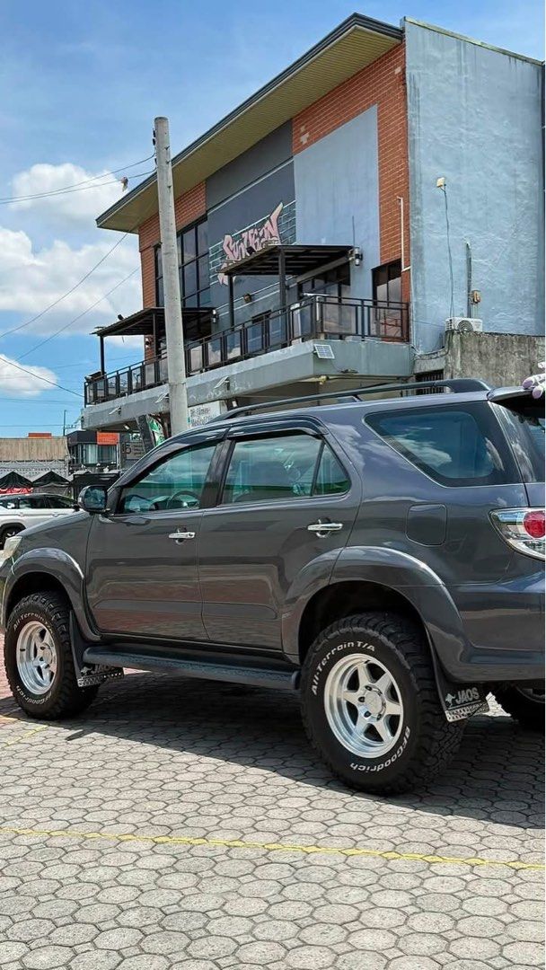 Toyota Fortuner V variant Auto (Category: Used Cars) located in Manila. Submitted by finest.deals (Listing ID 1462473502, Image 2). Description: toyota fortuner 2014 model V variant 4x2 (loaded) Automatic 106k mileage original Newly PMS OrionLed lights headlight,foglight 360 camera Android head unit Clear tint nano ceramic Clean paper Ready to transfer Ready for long drive! No engine/tranny issue No engine leak 2inch lift by ADZ GARAGE -Profender