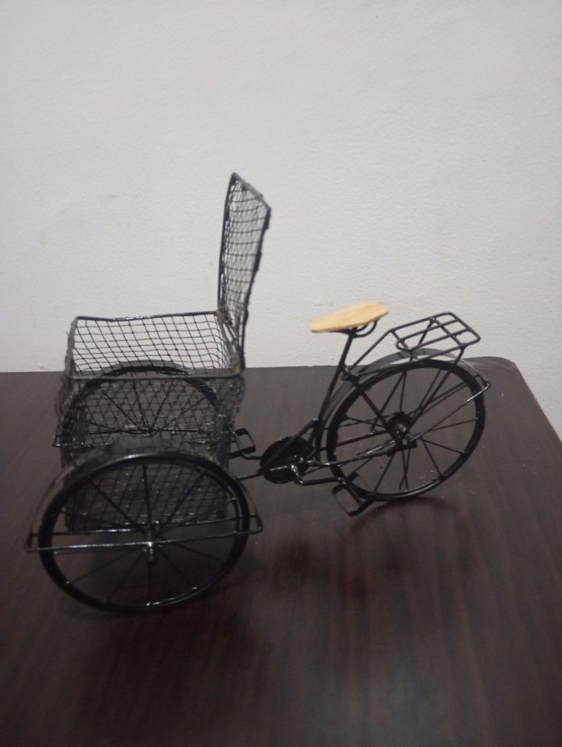 Tricycle metal (Category: Other Home Decor) located in Las Pinas. Submitted by the_recycle_shop (Listing ID 1462590776, Image 2). Description: Metal material 4 inches tall 8 inches long.