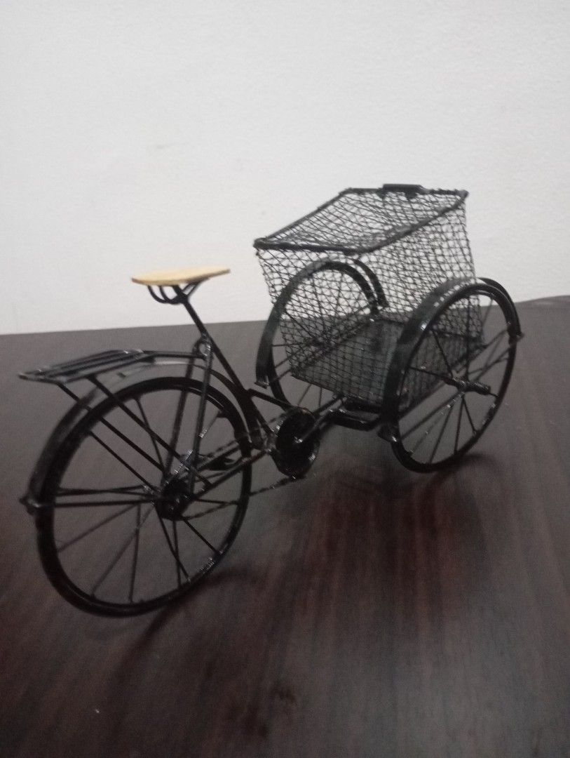 Tricycle metal (Category: Other Home Decor) located in Las Pinas. Submitted by the_recycle_shop (Listing ID 1462590776, Image 3). Description: Metal material 4 inches tall 8 inches long.