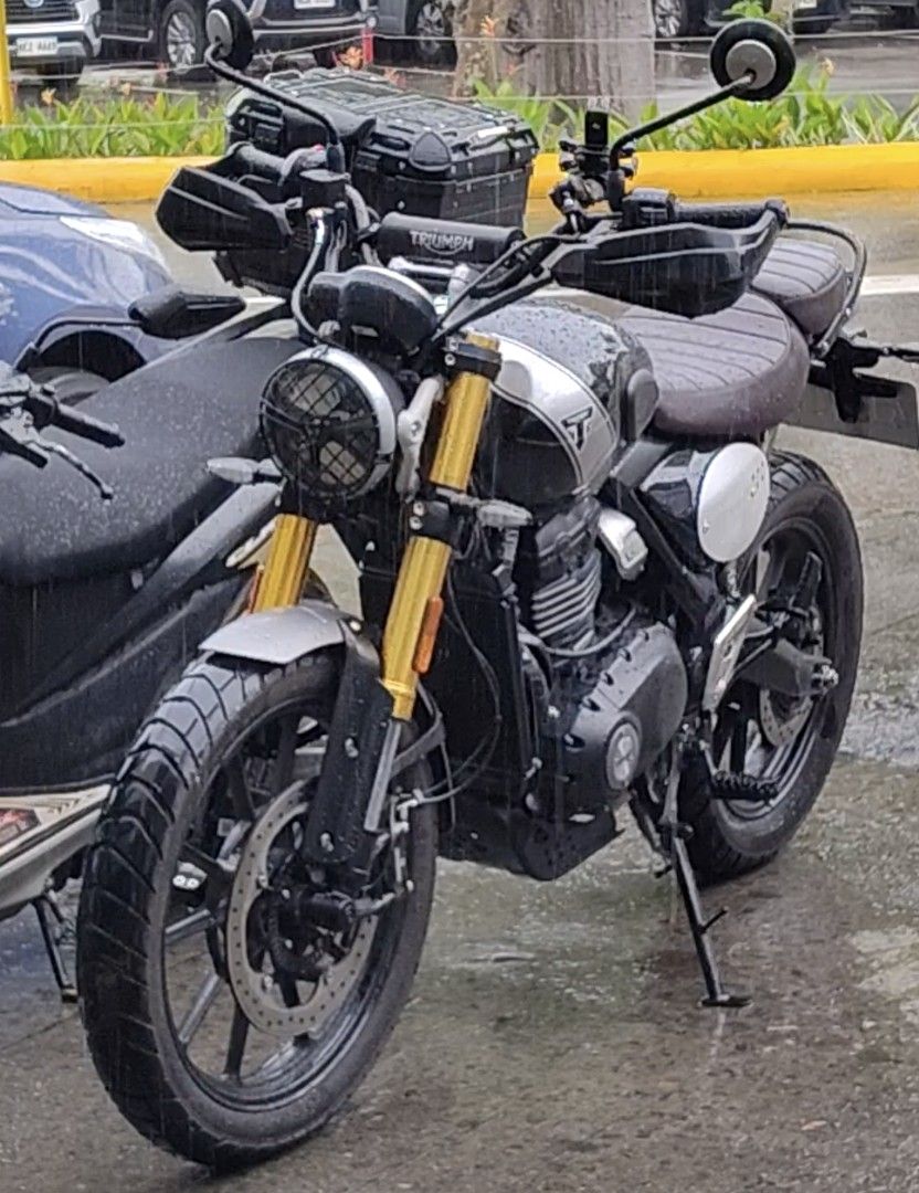 Triumph Scrambler 400X (Category: Motorbikes for Sale) located in San Pedro. Submitted by kapitankulot (Listing ID 1462510382, Image 2). Description: Triumph Scrambler 400 X Key Specifications & Features Engine: 398cc liquid-cooled, single-cylinder, 4-valve DOHC Power & Torque: 40 PS (39.5 hp) at 8,000 rpm and 37.5 Nm at 6,500 rpm Transmission: 6-speed gearbox with a slip-and-assist clutch Suspension: 43mm USD big piston forks front (150mm travel
