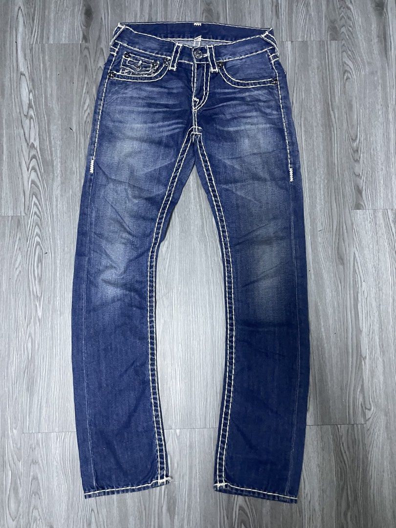 True Religion Jeans - White Stitching - Blue Denim (Category: Jeans) located in Manila. Submitted by yourfavoriteplug (Listing ID 1462509184, Image 1). Description: - Classic blue denim jeans from True Religion - Signature white contrast stitching throughout - Straight leg fit - Button fly closure - Perfect for everyday wear.
