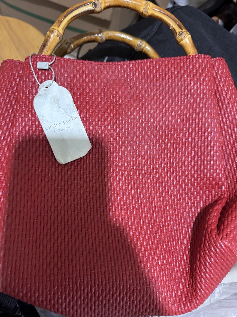 Two way handbag /sling bag bt Cache Cache (Category: Luxury Bags & Wallets) located in Marikina City. Submitted by luvbags40524 (Listing ID 1462612299, Image 1). Description: Good condition Bamboo top handles Dm for interested .