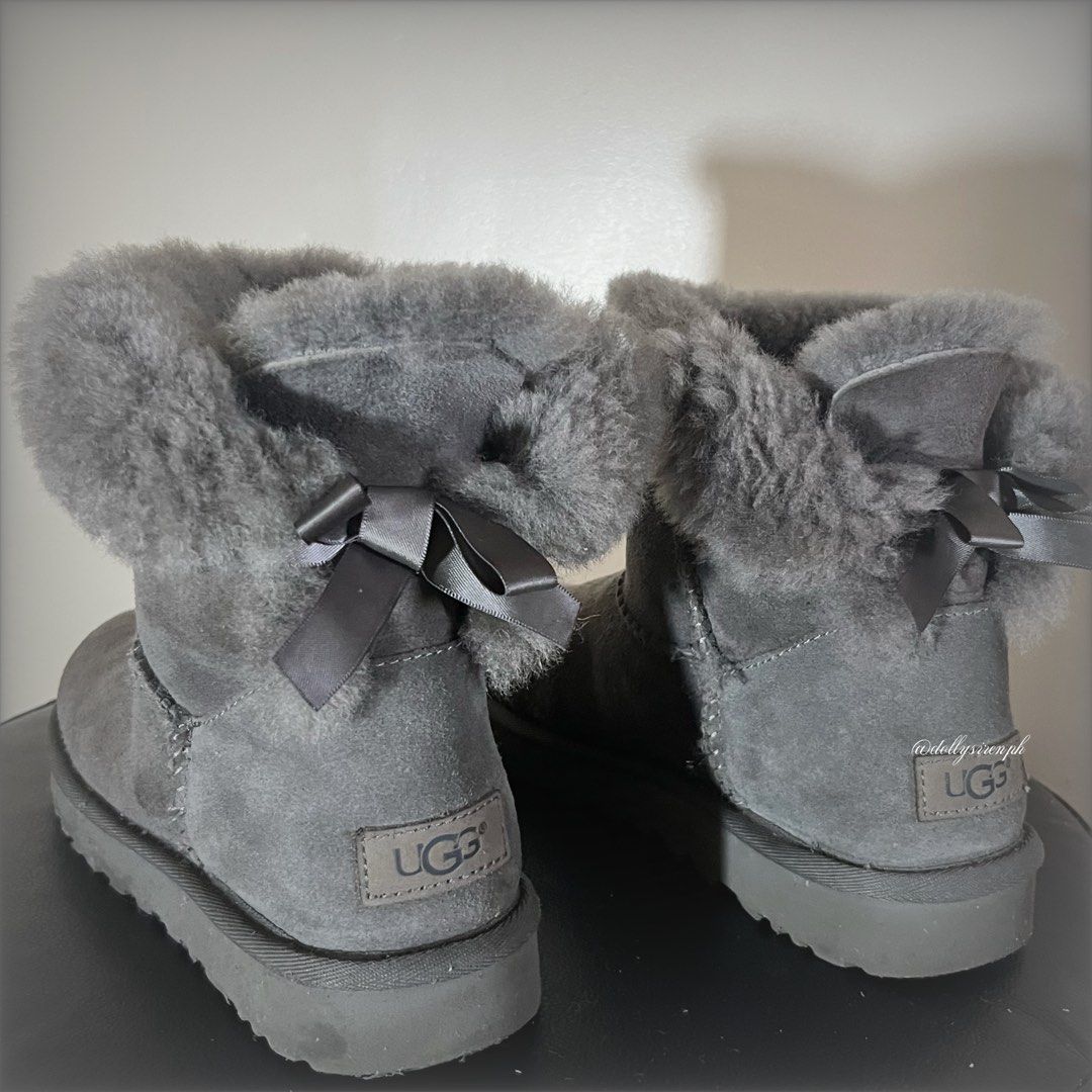 UGG Mini Bailey Bow (Category: Boots) located in Quezon City. Submitted by reverencesiren.ph (Listing ID 1462637405, Image 2). Description: ୭ ᵎᵎ item’s details : ✉︎ brand : UGG ✉︎ size : usa : 7 | uk : 5 | eu : 38 ✉︎ more details : - good condition ! cleaned water stains; minor, unnoticeable shading remains on the suede but doesn’t affect look. - vv comfy and still looks good ! .