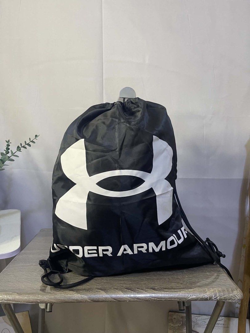 Under Armour Black Drawstring Bag (Category: Backpacks) located in Manila. Submitted by netgnet (Listing ID 1462449333, Image 1). Description: - Black Under Armour drawstring bag - Features a large UA logo on the front - Simple and functional design - Ideal for gym sessions or everyday carry - Easy and convenient to use.