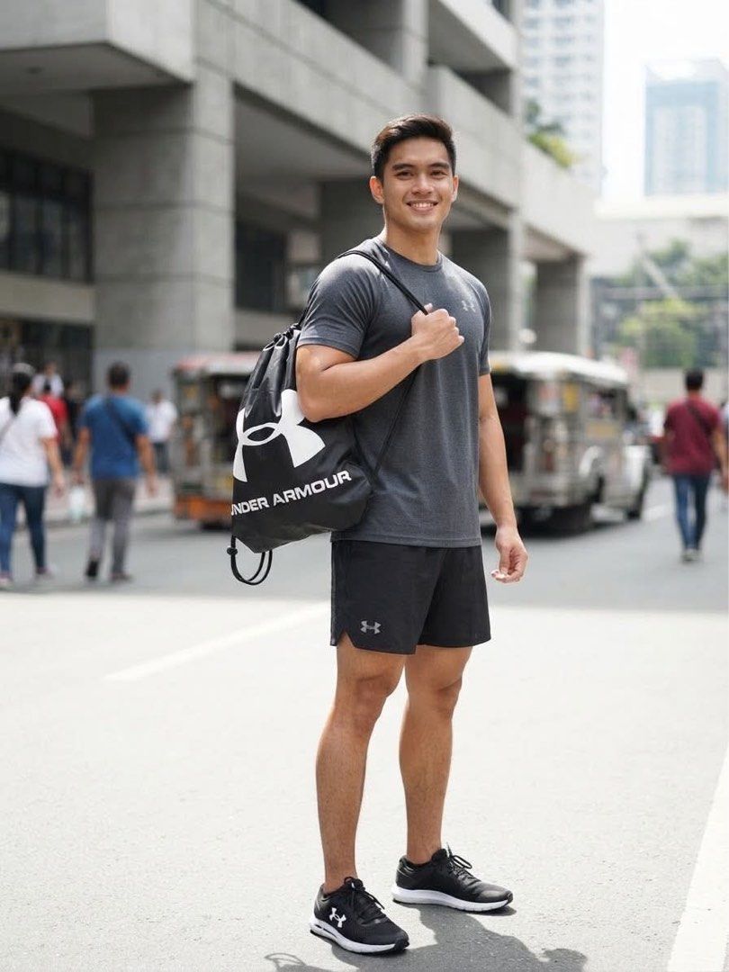 Under Armour Black Drawstring Bag (Category: Backpacks) located in Manila. Submitted by netgnet (Listing ID 1462449333, Image 3). Description: - Black Under Armour drawstring bag - Features a large UA logo on the front - Simple and functional design - Ideal for gym sessions or everyday carry - Easy and convenient to use.
