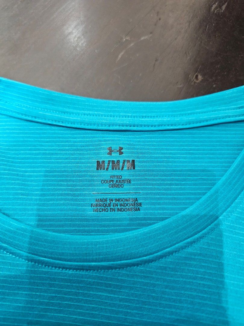 Under Armour functional short-sleeve t-shirt (Category: Activewear) located in Baguio. Submitted by kayeonlineshop (Listing ID 1462537366, Image 3). Description: -bright blue Under Armour functional short-sleeve t-shirt featuring a silver Mercedes-Benz logo on the chest.