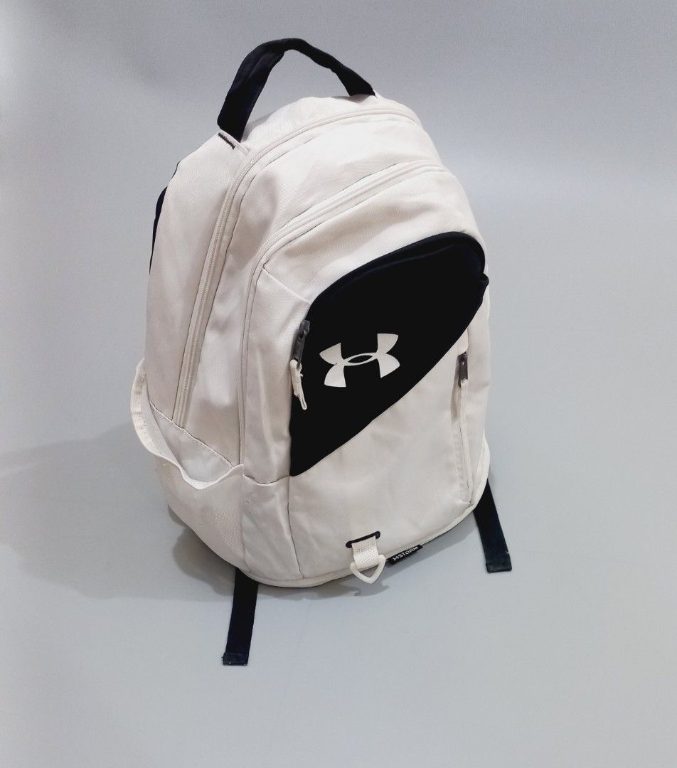 Under Armour White & Black Backpack Storm (Category: Backpacks) located in Cebu City. Submitted by MrLiks_123 (Listing ID 1462609212, Image 1). Description: - White and black Under Armour backpack - Features UA Storm technology for water resistance - Ample interior space for all your essentials - Smooth-working zippers for easy access - Adjustable straps for a comfortable fit - Ideal for sports , gym, school or everyday use.