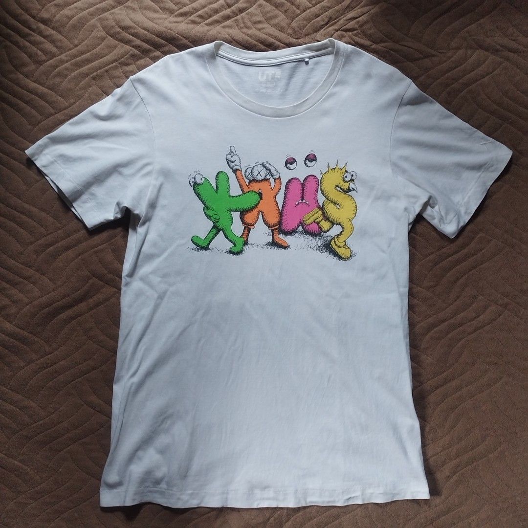 Uniqlo × Kaws T-Shirt (Category: Tshirts & Polo Shirts ) located in Davao. Submitted by giyuu06 (Listing ID 1462469455, Image 1). Description: Uniqlo × Kaws T-Shirt | Medium | Excellent Condition L 28 W 18.