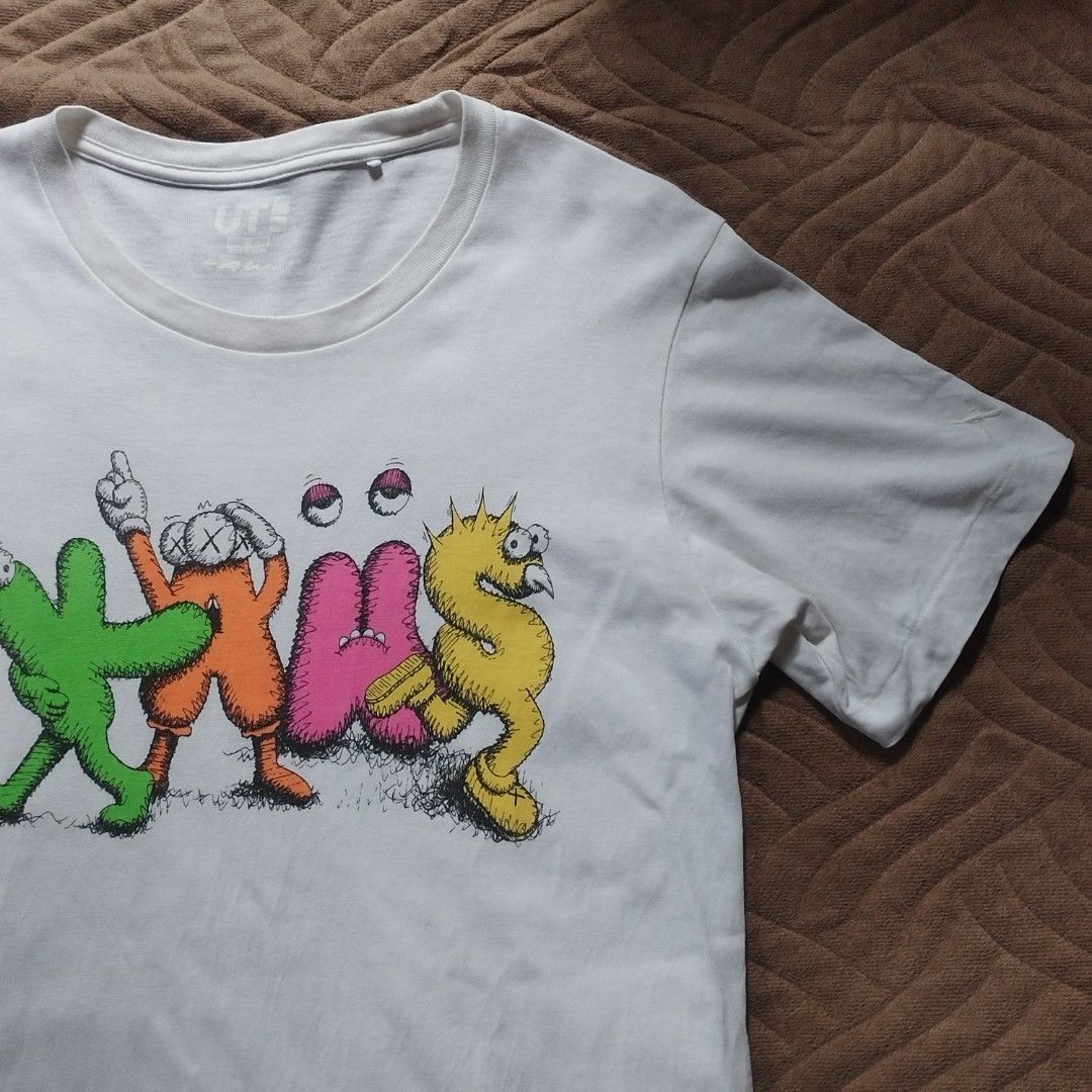 Uniqlo × Kaws T-Shirt (Category: Tshirts & Polo Shirts ) located in Davao. Submitted by giyuu06 (Listing ID 1462469455, Image 2). Description: Uniqlo × Kaws T-Shirt | Medium | Excellent Condition L 28 W 18.