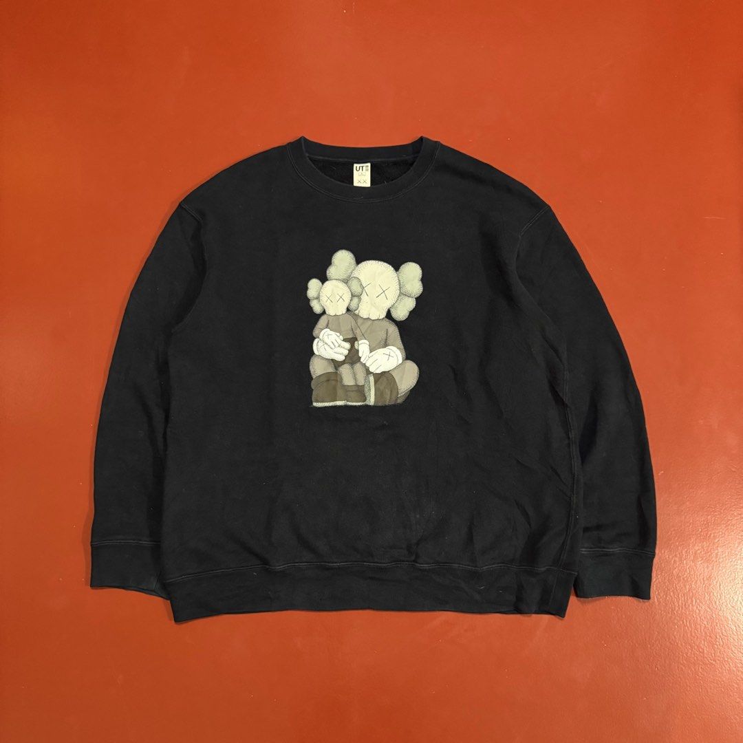 UNIQLO X KAWS PULLOVER (Category: Coats, Jackets and Outerwear) located in Pasig City. Submitted by buzzthrifty (Listing ID 1462613262, Image 1). Description: SIZE L-XL 24x28 EXCELLENT CONDITION WASH KONTI .
