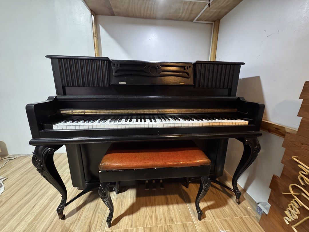 Upright Piano - Massenet (Category: Musical Instruments) located in Malabon City. Submitted by queen_kendra098 (Listing ID 1462450282, Image 2). Description: Reason for selling: Upgrading to another piano Recently inspected and tuned by a piano technician All 88 keys are working Hammers/action inspected and in good condition Internal mechanism shown in photos Includes bench with storage Refurbished black finish Key cover is slightly tight due to 