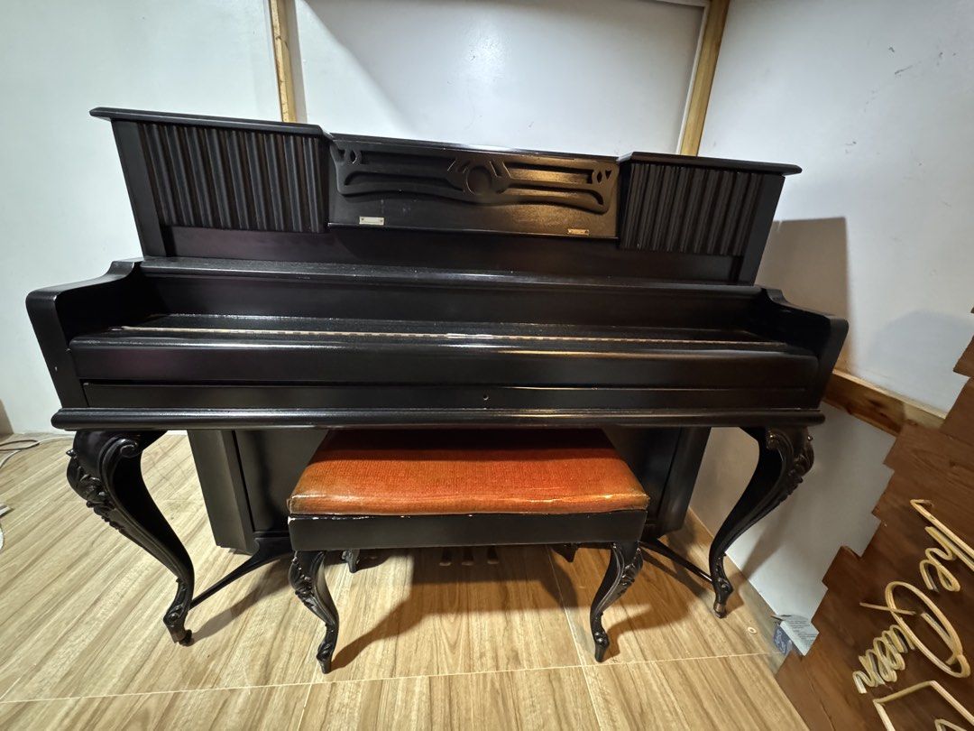 Upright Piano - Massenet (Category: Musical Instruments) located in Malabon City. Submitted by queen_kendra098 (Listing ID 1462450282, Image 3). Description: Reason for selling: Upgrading to another piano Recently inspected and tuned by a piano technician All 88 keys are working Hammers/action inspected and in good condition Internal mechanism shown in photos Includes bench with storage Refurbished black finish Key cover is slightly tight due to 