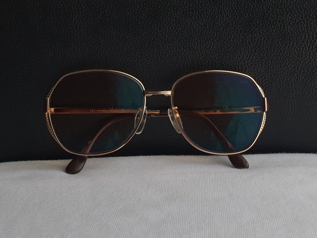 Valentino Garavani Eyeglass Frame (Category: Sunglasses & Eyewear) located in Quezon City. Submitted by WasalakTwo (Listing ID 1462588145, Image 3). Description: Bought in Japan Authentic Durable and high quality Goodcondition Clean and presentable Lens are graded, but replaceable Open for delivery nationwide Front Width 13.2cm Front Height 4.9cm.