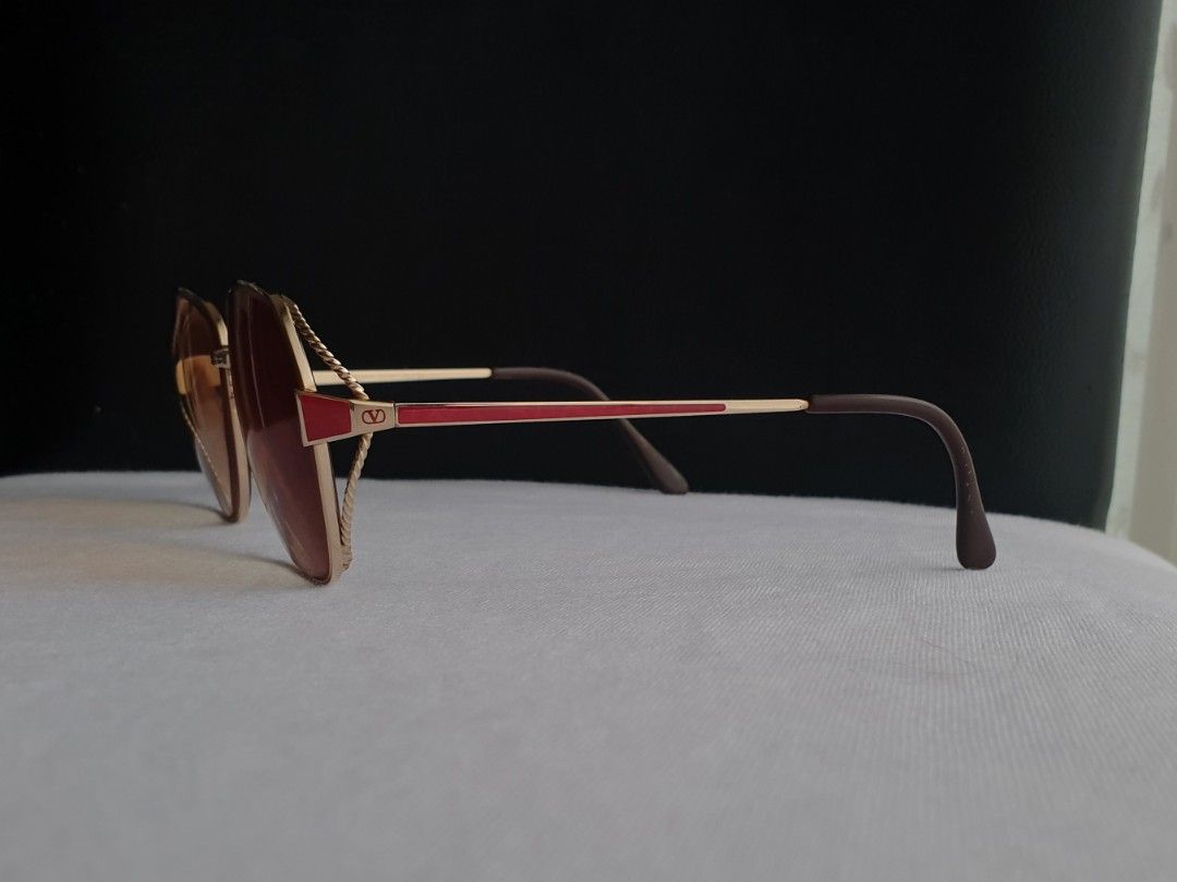 Valentino Garavani Eyeglass Frame (Category: Sunglasses & Eyewear) located in Quezon City. Submitted by WasalakTwo (Listing ID 1462588145, Image 2). Description: Bought in Japan Authentic Durable and high quality Goodcondition Clean and presentable Lens are graded, but replaceable Open for delivery nationwide Front Width 13.2cm Front Height 4.9cm.