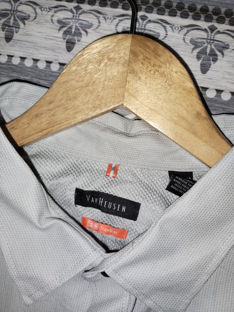 XL Van Heusen Shirt (Category: Tshirts & Polo Shirts ) located in Mabalacat. Submitted by al_amin_thrift (Listing ID 1462439894, Image 2). Description: Van Heusen Traveler Light Gray Shirt L31 W26 ​ - ✅ Authentic Van Heusen — Traveler Series ​ - Wrinkle‑resistant, breathable mesh lining — ideal for work & travel ​ - Light gray — versatile smart casual ​ - Size tag visible — fill in: ___ ​ - Pre‑owned: clean, no damage Trusted quality — always rea
