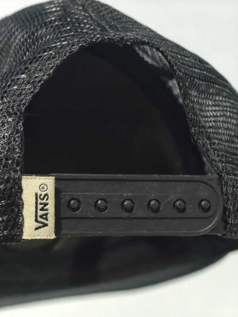 Vans Off The Wall Trucker Cap Palm Leaf Pattern (Category: Caps & Hats) located in Tagum. Submitted by tripthrift2026 (Listing ID 1462624942, Image 2). Description: - Vans trucker cap with a cool palm leaf design - Black mesh back for breathability - Adjustable snapback closure for a custom fit - Made in Vietnam - Ideal for sunny days or adding a stylish touch to any outfit.