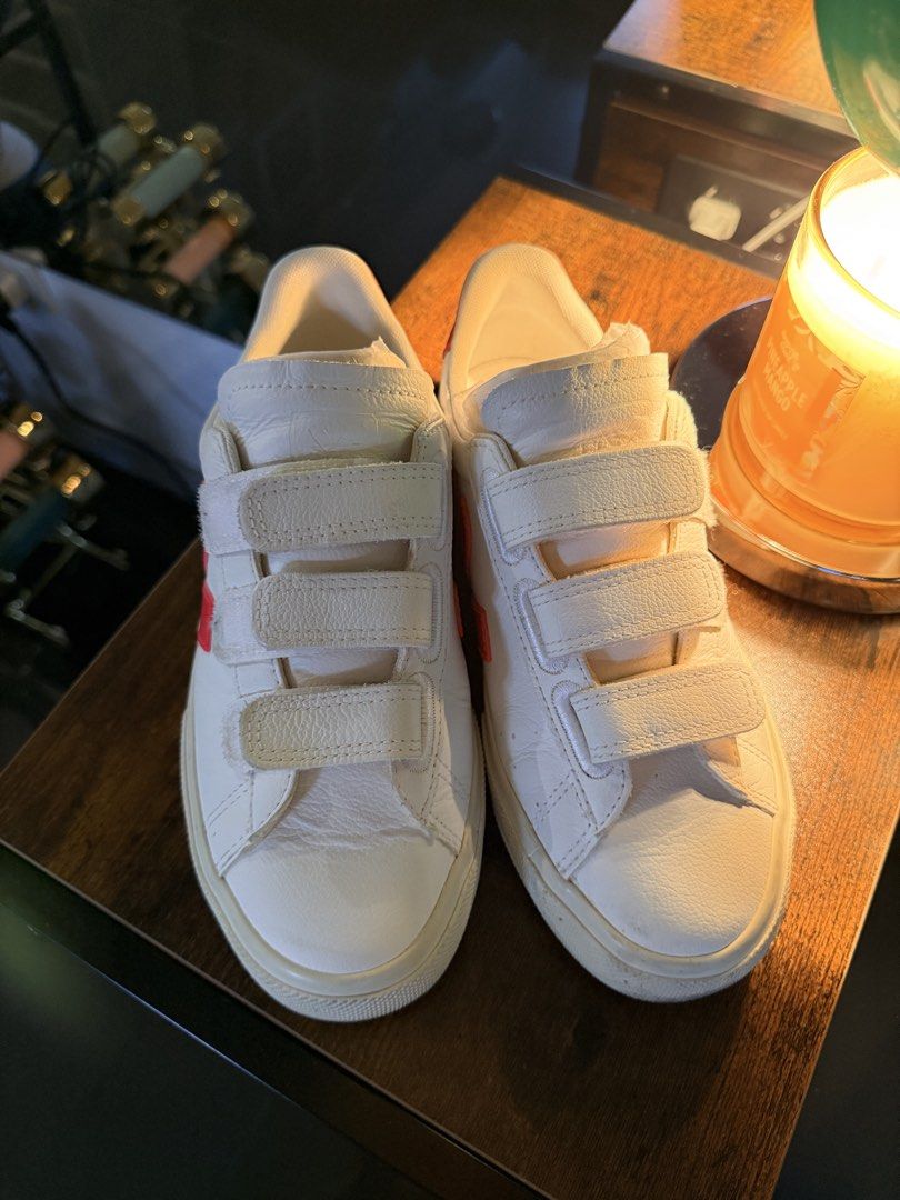 Veja Recife Extra White-Rose Fluo EU37 (Category: Sneakers) located in Quezon City. Submitted by yourheaduhunter (Listing ID 1462554558, Image 2). Description: - White leather Veja sneakers - Iconic red V logo on the side - Easy velcro strap closure - Red Fluo heel accent with 'VEJA' print - No box na- I store my shoes in a cabinet - Used only thrice because I prefer other sneakers at the moment.