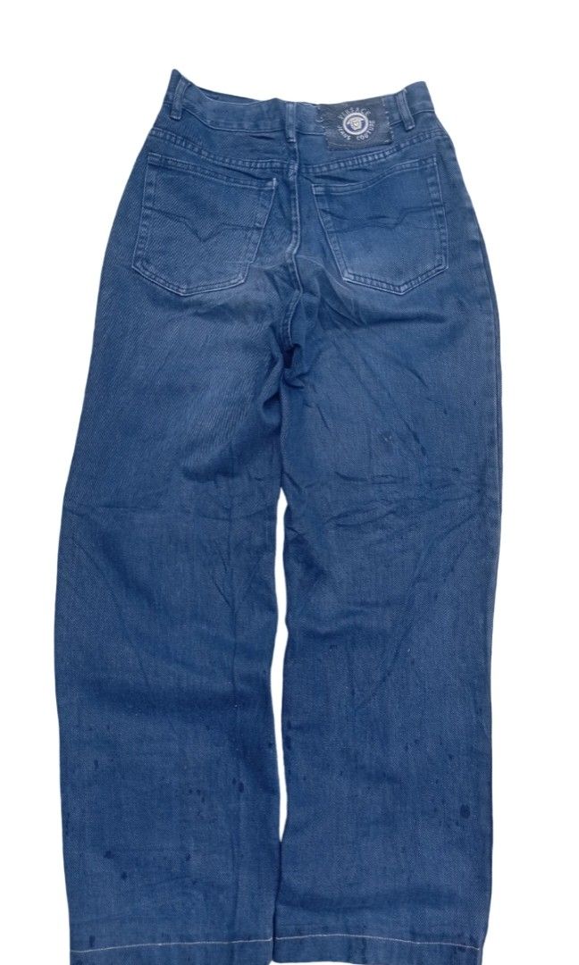 Versace Jeans Couture (Category: Activewear) located in Sindangan. Submitted by barak_ukay (Listing ID 1462443434, Image 3). Description: Good condition Pm more details No issue Versace Jeans Couture denim pants were made in the mid-to-late 1990s (specifically around 1995 These are vintage Versace Jeans Couture dark blue denim jeans featuring a signature silver-tone Medusa button and woven brand label patches..