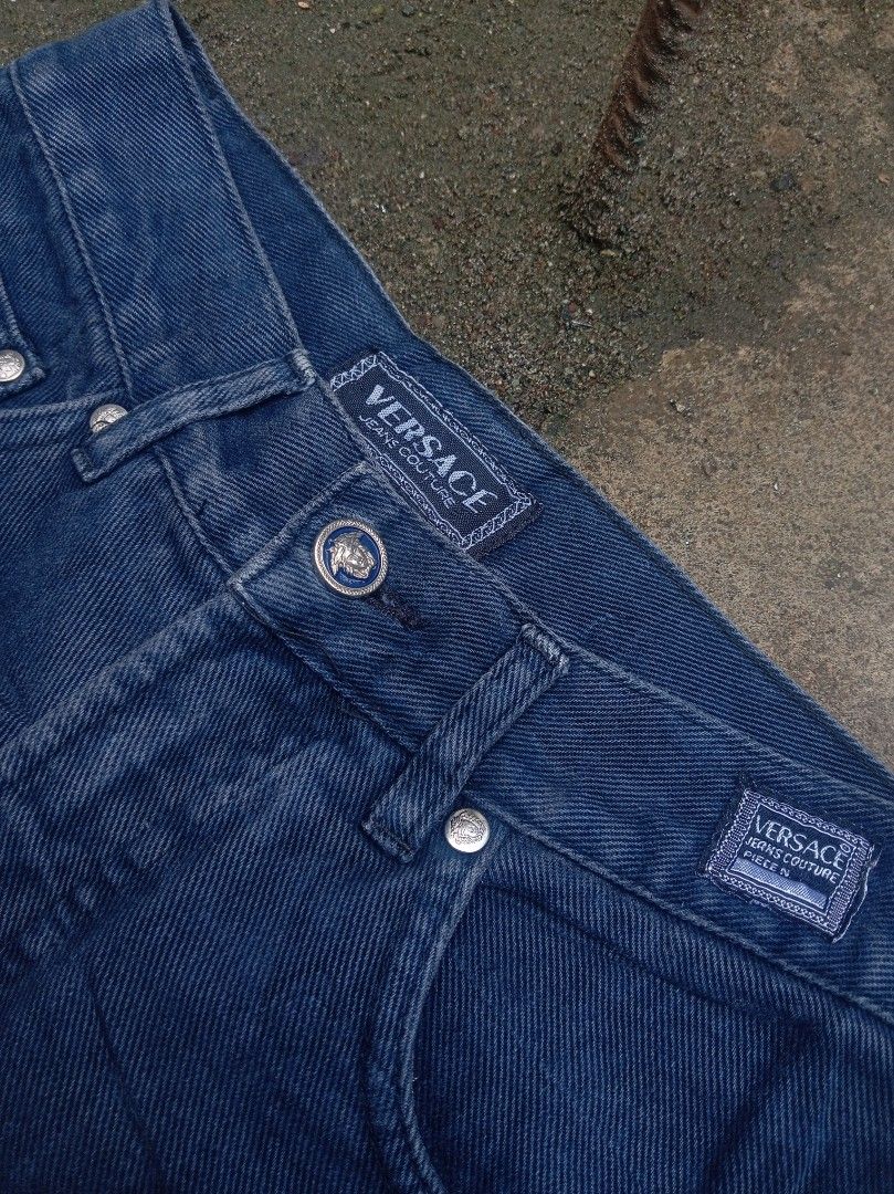 Versace Jeans Couture (Category: Activewear) located in Sindangan. Submitted by barak_ukay (Listing ID 1462443434, Image 1). Description: Good condition Pm more details No issue Versace Jeans Couture denim pants were made in the mid-to-late 1990s (specifically around 1995 These are vintage Versace Jeans Couture dark blue denim jeans featuring a signature silver-tone Medusa button and woven brand label patches..