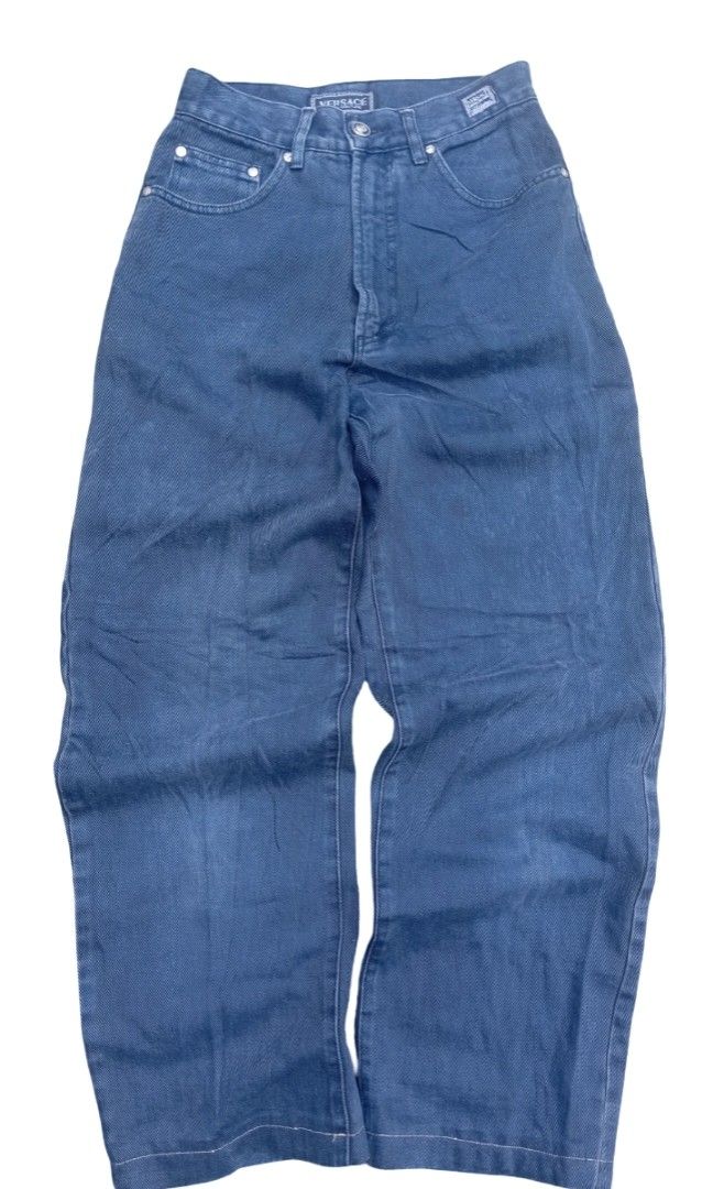 Versace Jeans Couture (Category: Activewear) located in Sindangan. Submitted by barak_ukay (Listing ID 1462443434, Image 2). Description: Good condition Pm more details No issue Versace Jeans Couture denim pants were made in the mid-to-late 1990s (specifically around 1995 These are vintage Versace Jeans Couture dark blue denim jeans featuring a signature silver-tone Medusa button and woven brand label patches..