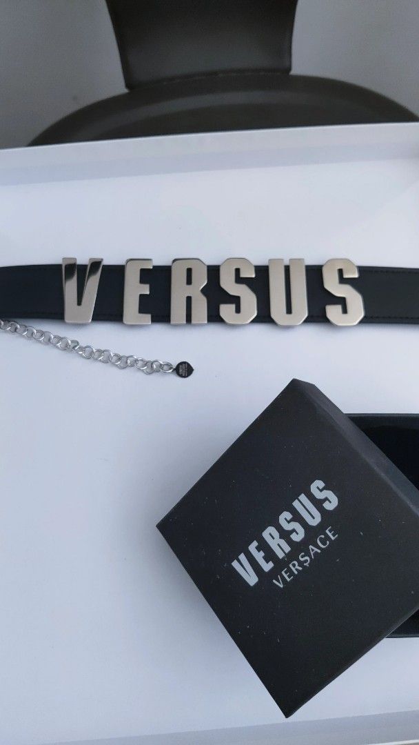 Versus Versace Logo Choker Necklace (Category: Necklaces) located in Makati City. Submitted by trevarucci (Listing ID 1462550792, Image 1). Description: - Genuine black leather choker with stainless steel. - Features silver 'VERSUS' logo letters - Adjustable silver chain for a perfect fit - Comes with the original Versus Versace box - A bold statement accessory to elevate any look.