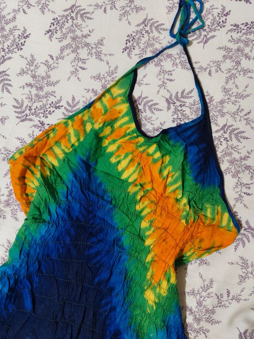 vibrant tie-dye Y2K-style halter top (Category: Sleeveless) located in Bulacan. Submitted by angel.decluttersx (Listing ID 1462600182, Image 2). Description: m-l ww provided cotton fabric material issue: garter at back kind of loose na needs repair sa likod.