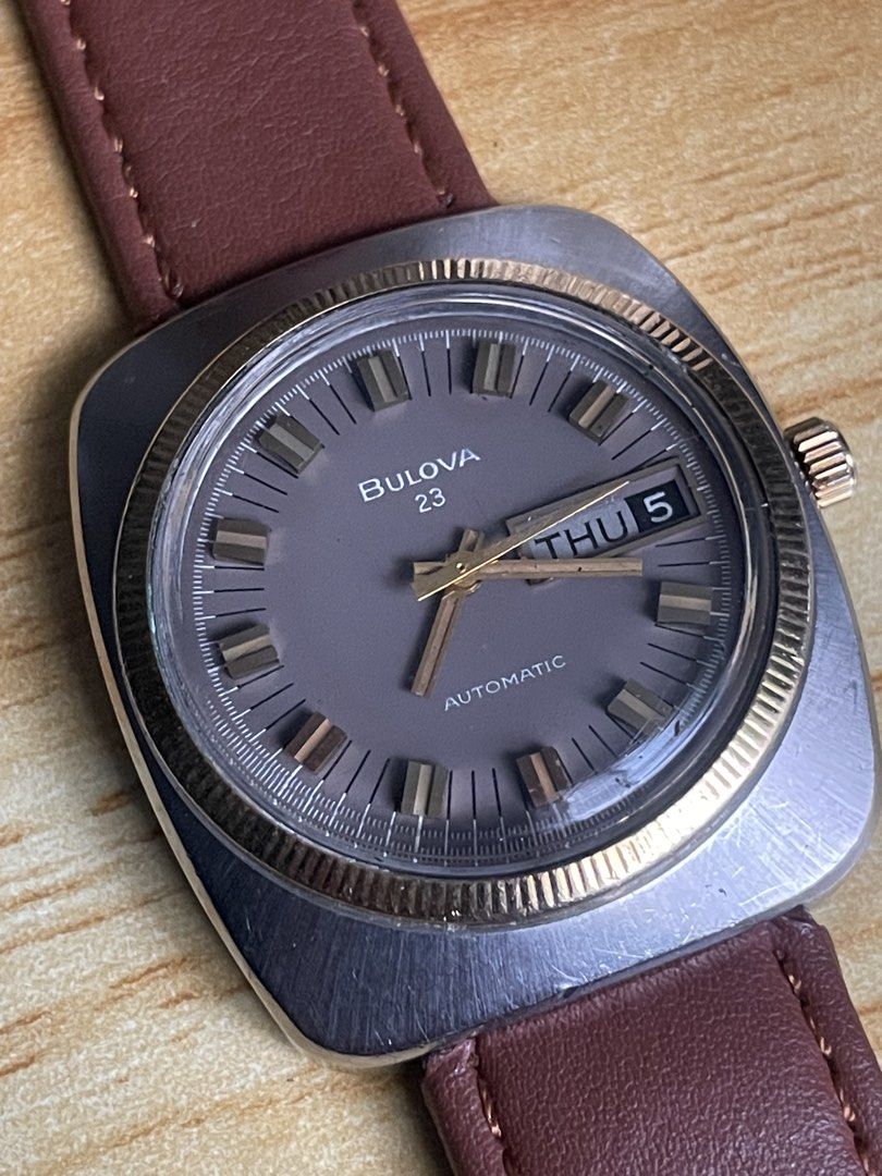 Vintage Bulova Senator F (Category: Men's Watches) located in Taguig. Submitted by tester1x (Listing ID 1462477201, Image 3). Description: Vintage Bulova Senator F 1970’s Automatic Day/Date Swiss Made Bulova N4 T027791 Brown Dial 10k Bezel Stainless Steel Case SS Back Case 35 x 40mm Replacement Strap. Orig. buckle .