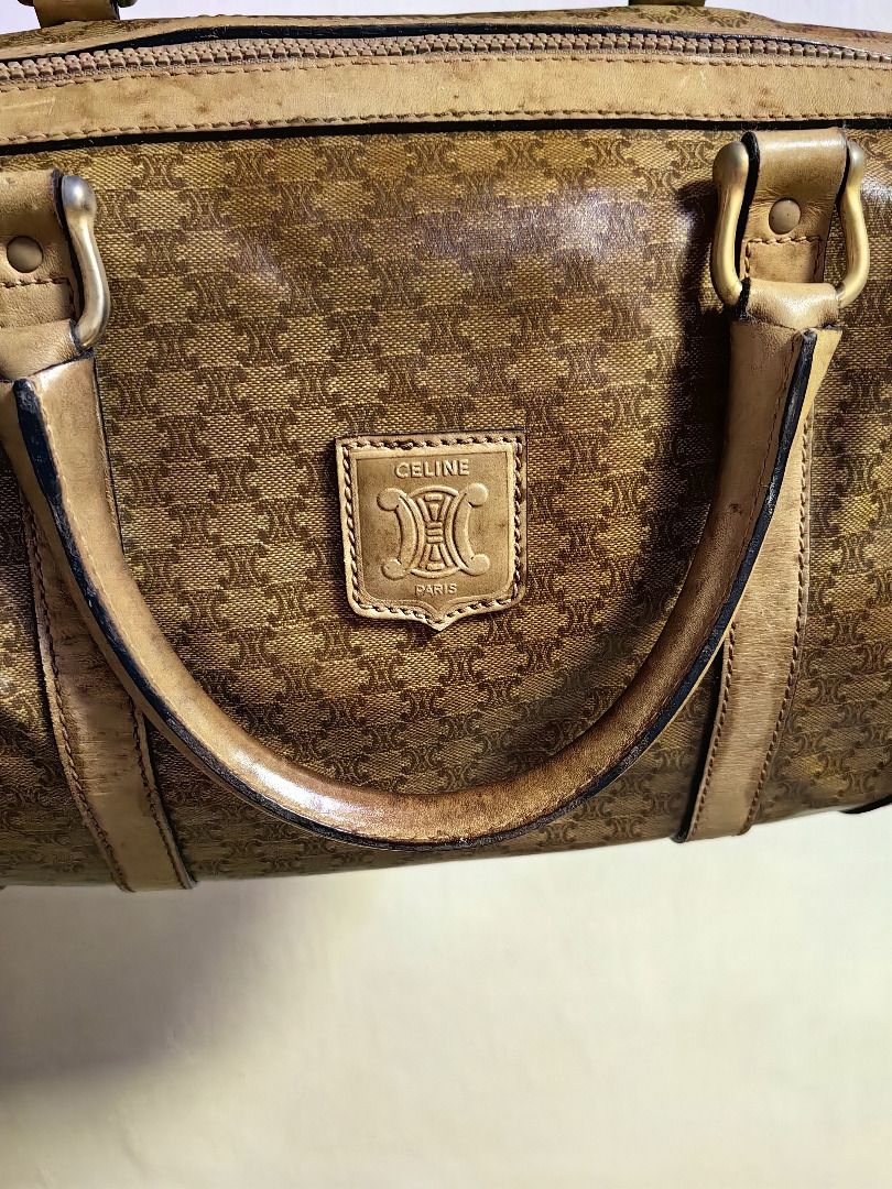 Vintage Celine Monogram Boston Bag (Category: Luxury Bags & Wallets) located in Tarlac. Submitted by jeremiah.curator.2026 (Listing ID 1462673210, Image 2). Description: - Vintage Celine Boston Bag - Classic all-over monogram print - Genuine leather handles and trim - Secure zipper closure - Signs of wear on leather/trim, consistent with age - Perfect for stylish everyday use.