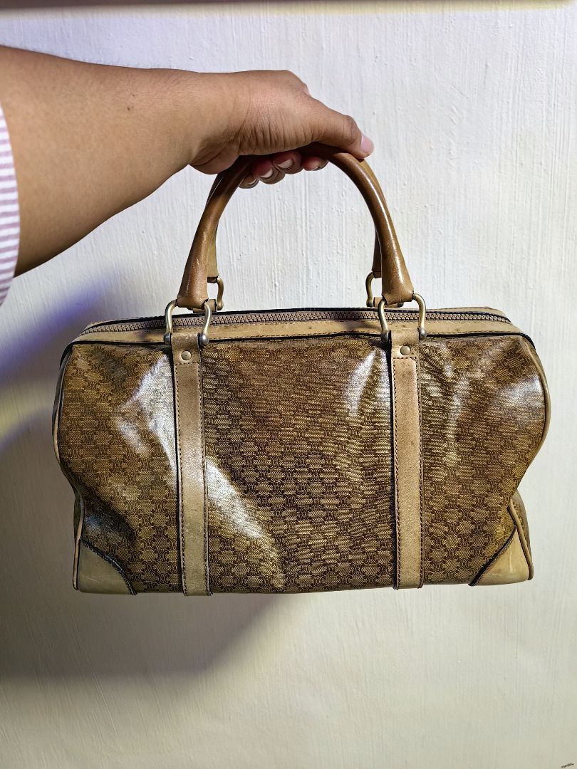 Vintage Celine Monogram Boston Bag (Category: Luxury Bags & Wallets) located in Tarlac. Submitted by jeremiah.curator.2026 (Listing ID 1462673210, Image 3). Description: - Vintage Celine Boston Bag - Classic all-over monogram print - Genuine leather handles and trim - Secure zipper closure - Signs of wear on leather/trim, consistent with age - Perfect for stylish everyday use.
