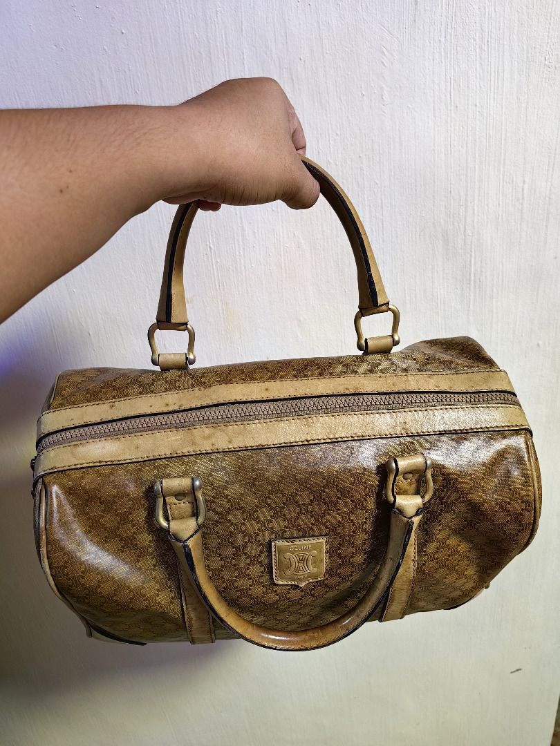 Vintage Celine Monogram Boston Bag (Category: Luxury Bags & Wallets) located in Tarlac. Submitted by jeremiah.curator.2026 (Listing ID 1462673210, Image 1). Description: - Vintage Celine Boston Bag - Classic all-over monogram print - Genuine leather handles and trim - Secure zipper closure - Signs of wear on leather/trim, consistent with age - Perfect for stylish everyday use.